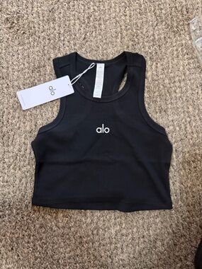 Alo Yoga Aspire Tank in black.